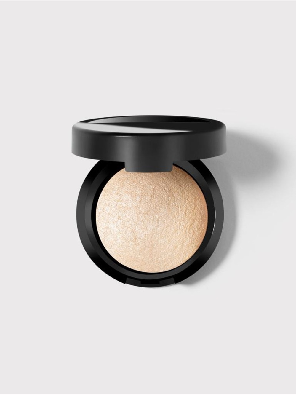 Laura Geller Baked Highlighter - Champagne- Travel Size